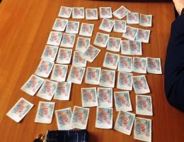 Підозра менеджеру, який пропонував правоохоронцям 20 тис грн