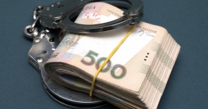 На систематичному хабарництві викрито держвиконавця