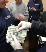 На хабарі 900 доларів за визнання призовника непридатним до військової служби затриманий голова військово-лікарської комісії